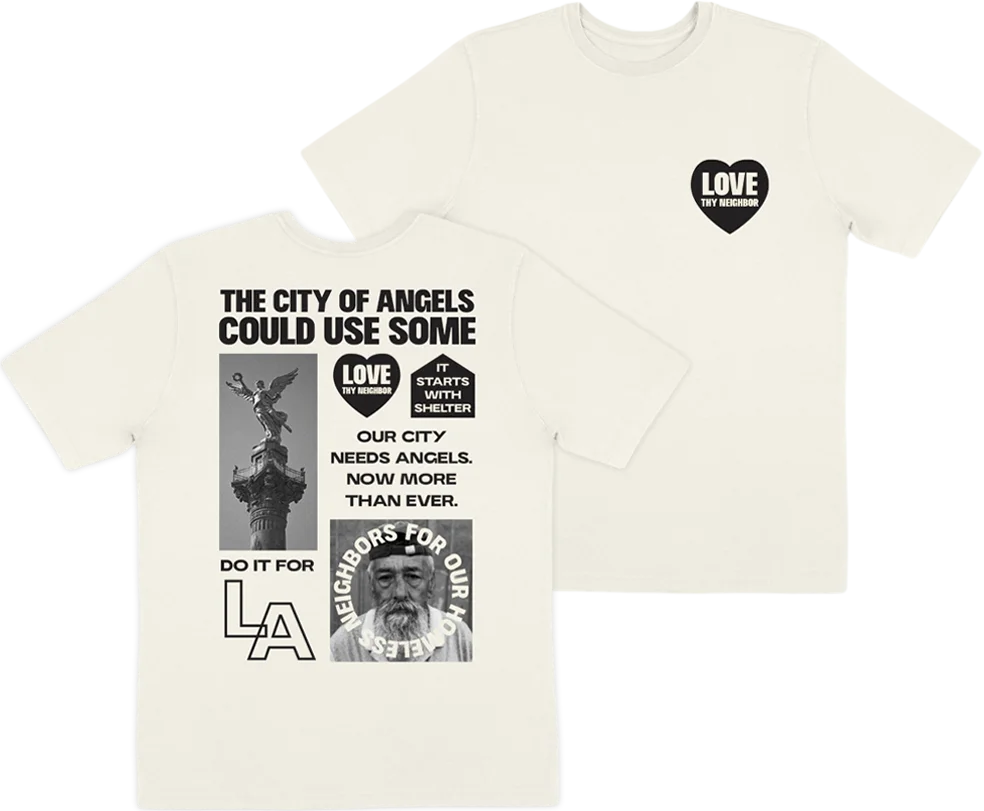 Cream campaign T-shirt featuring monochrome Los Angeles Mission fundraising graphics and civic-minded messaging.